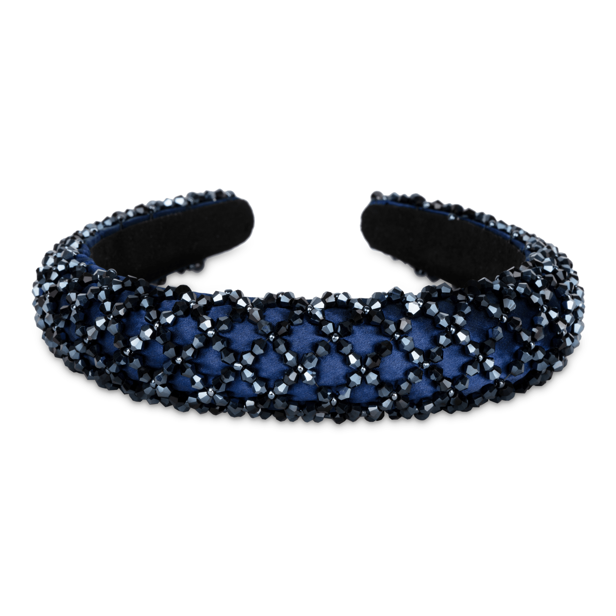 Polstret mørkeblå hårbøjle med sorte perler i mønster.