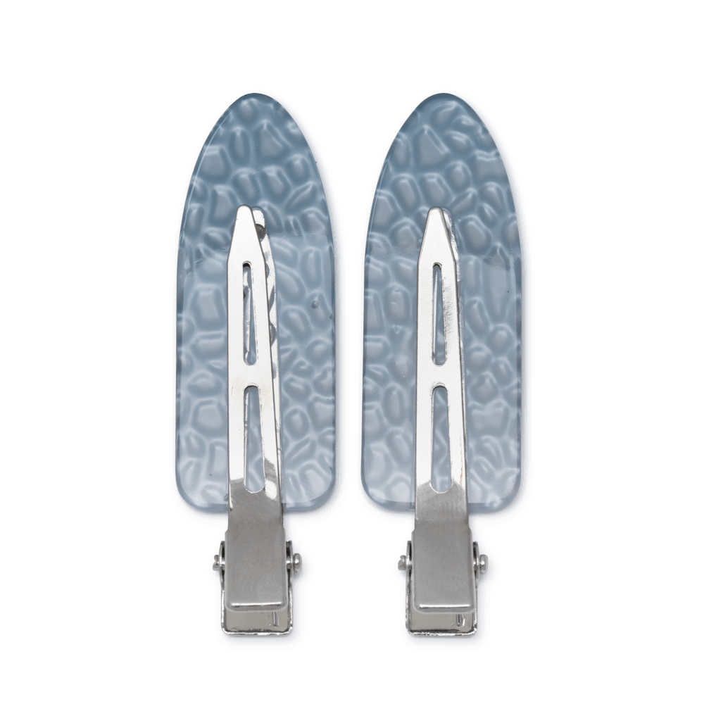 Elizabeth Clips 2 stk. fra SUI AVA – stilfulde hårklemmer med et elegant og tidløst design, ideelle til at skabe sofistikerede og feminine frisurer.