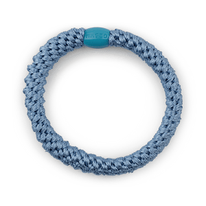 Basic blå hårelastik med vævet tekstur og blødt greb – ideel til daglig brug