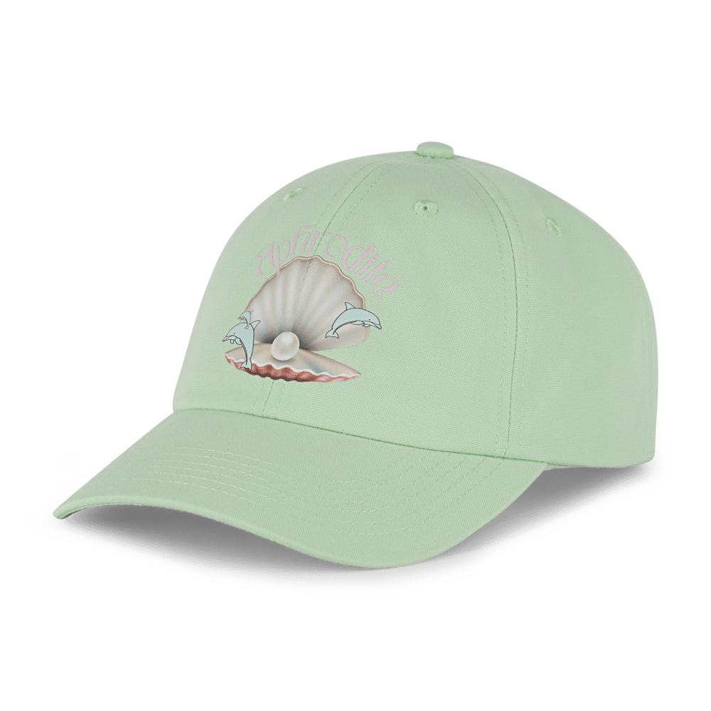 Lysegrøn cap med delfin- og perleprint samt "Aphrodite" tekst fra SUI AVA