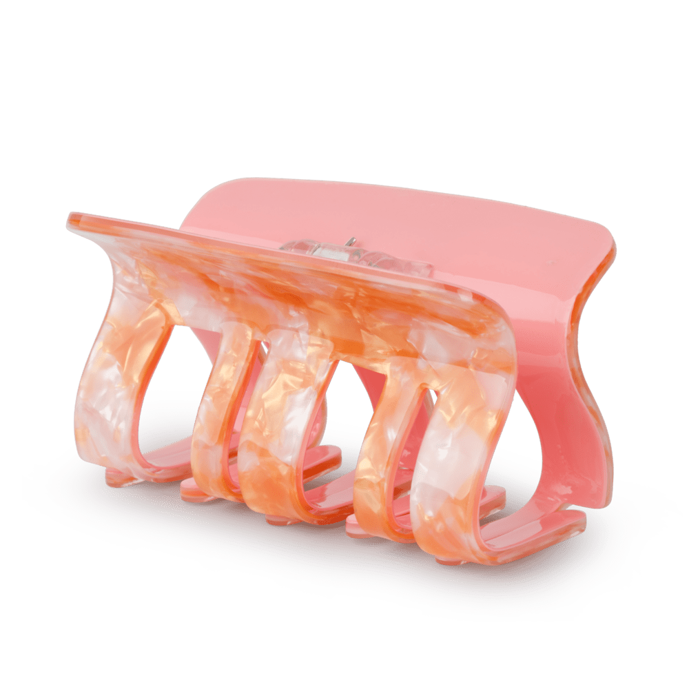 Stor rosa hårklemme med perlemorsglans i fersken og lyserøde nuancer