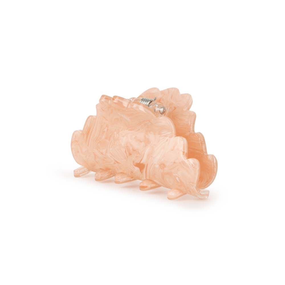 Simone Attract Mini hårklemme i lys fersken med marmoreffekt.