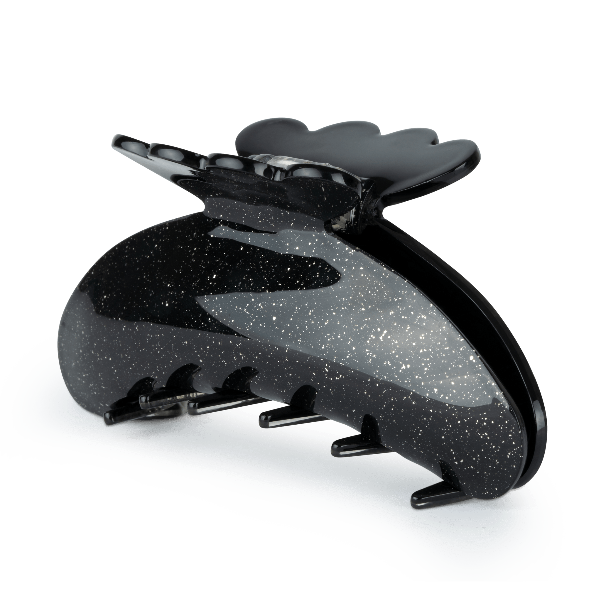 Stor hårklemme i Obsidian Black med glimmereffekt fra SUI AVA. Helle Starry Night Big har et elegant design og et stærkt greb – ideel til langt og kraftigt hår.