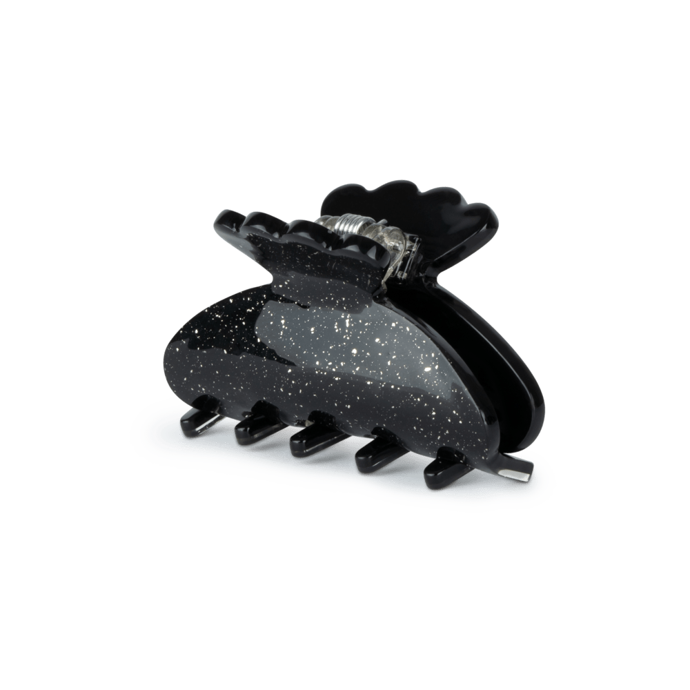 Helle Starry Night Mini hårklemme i sort med glimtende stjernestøv-look.