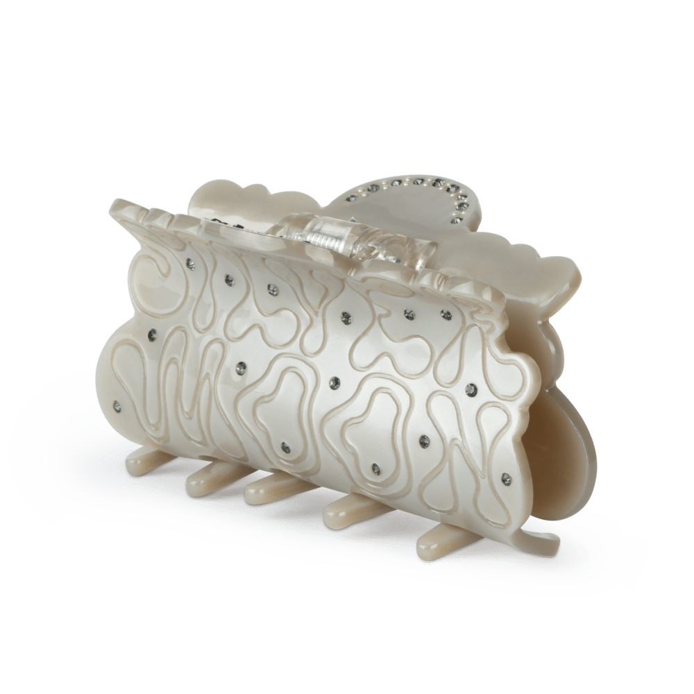 Perlemorshvid hårklemme med bølgemønster og små klare sten – Silvermoon Big fra SUI AVA.