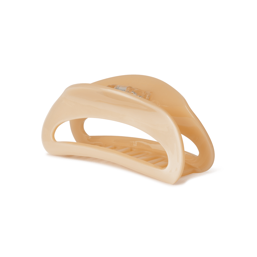 Theresa Ginger Big – stor beige hårklemme med glansfuld finish og buet design