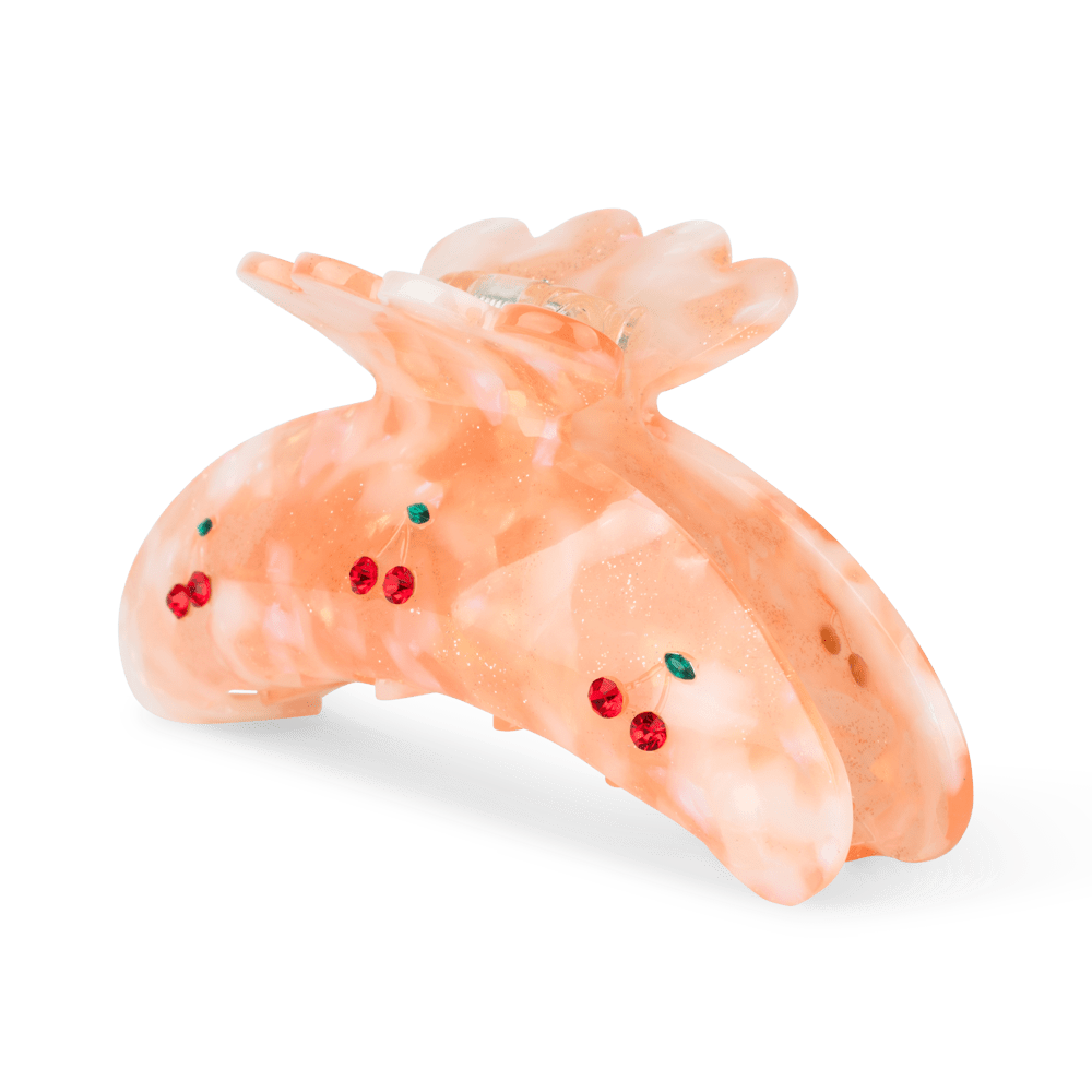 Stor ferskenfarvet hårklemme med røde kirsebærsten og glimmerdetaljer – Cherry Up Big fra SUI AVA