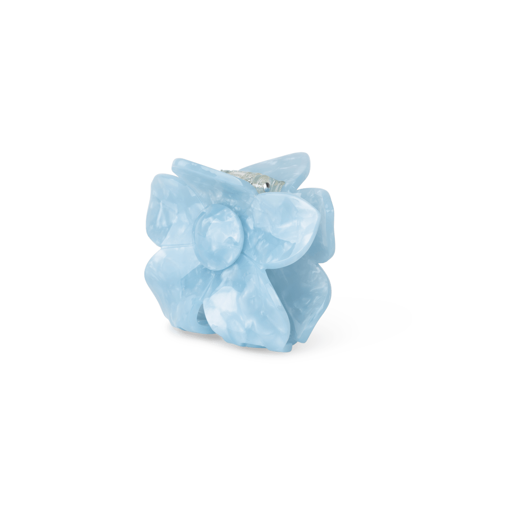 Flower Power Big – stor lyseblå hårklemme formet som en blomst.