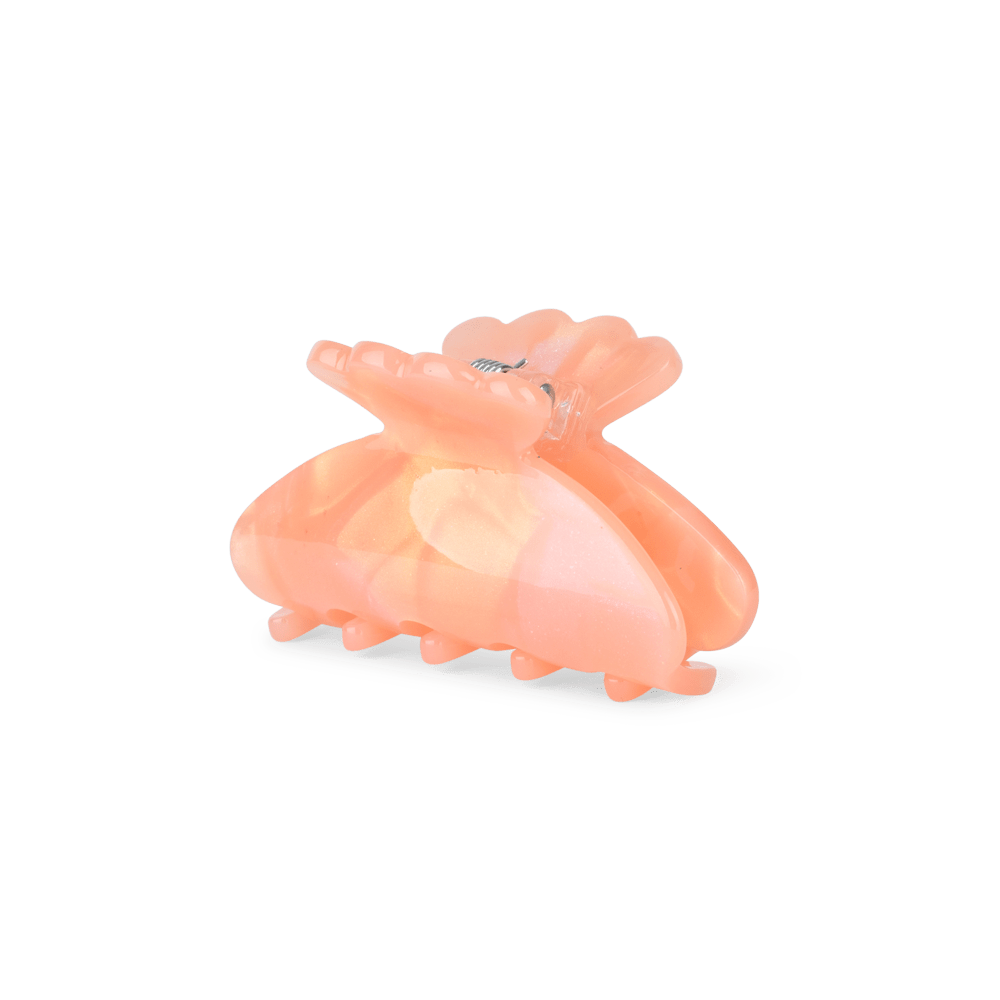 Helle Sunkissed Mini – lille ferskenfarvet hårklemme med perlemorseffekt.