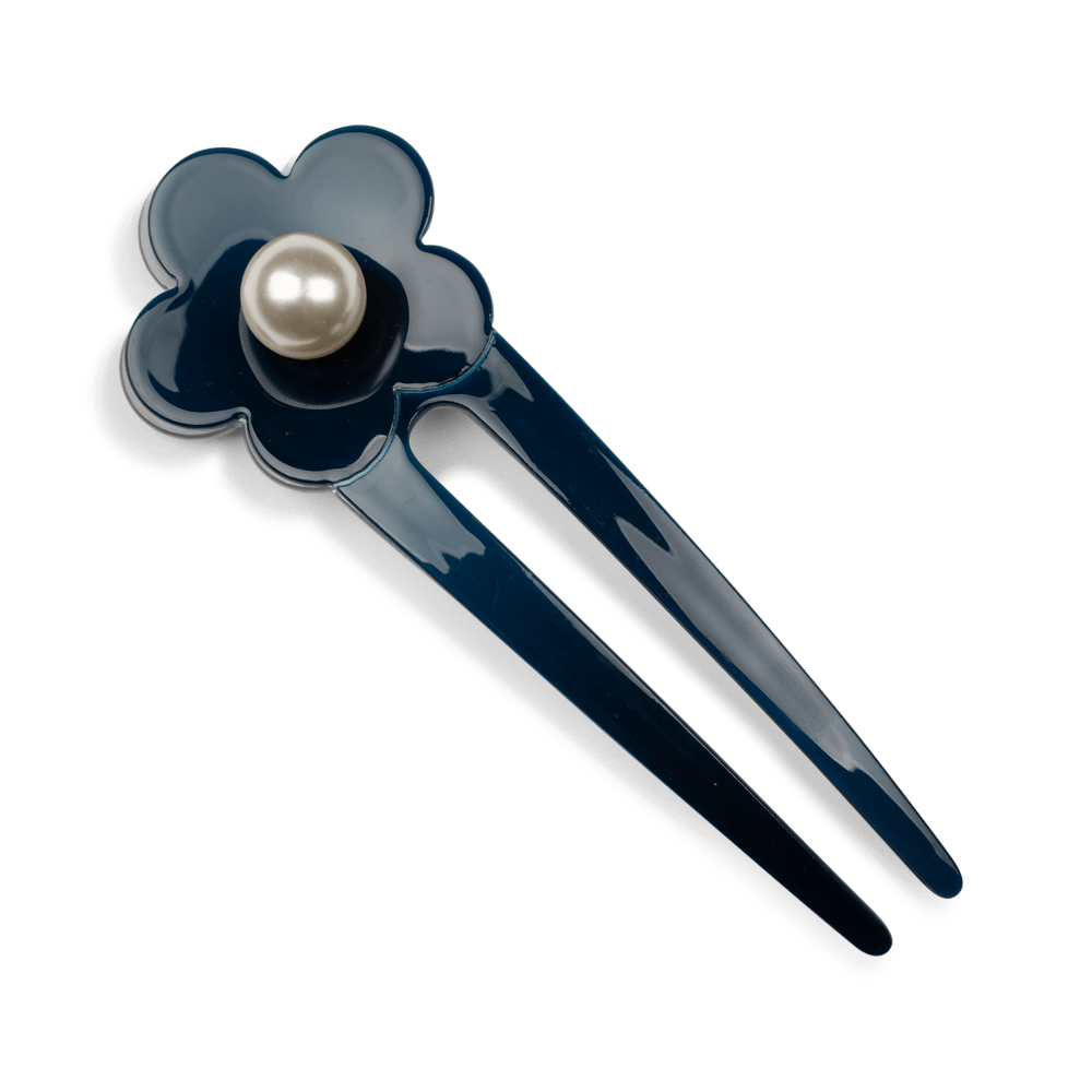 Eva Classic Flower Clip fra SUI AVA – elegant hårklemme med delikate blomsterdetaljer, ideel til at skabe feminine og stilfulde frisurer.