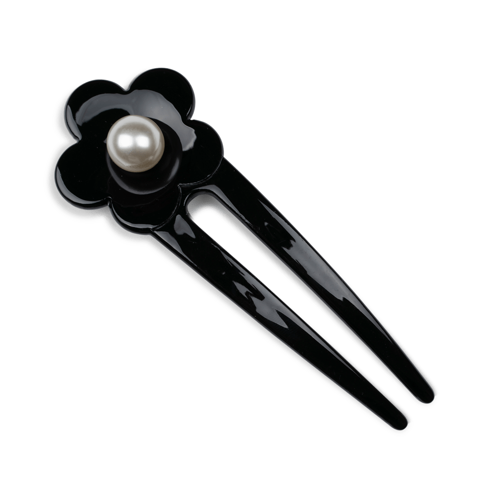 Eva Classic Flower Clip fra SUI AVA – stilfuld hårklemme med et klassisk blomsterdesign, ideel til at skabe elegante og feminine frisurer.