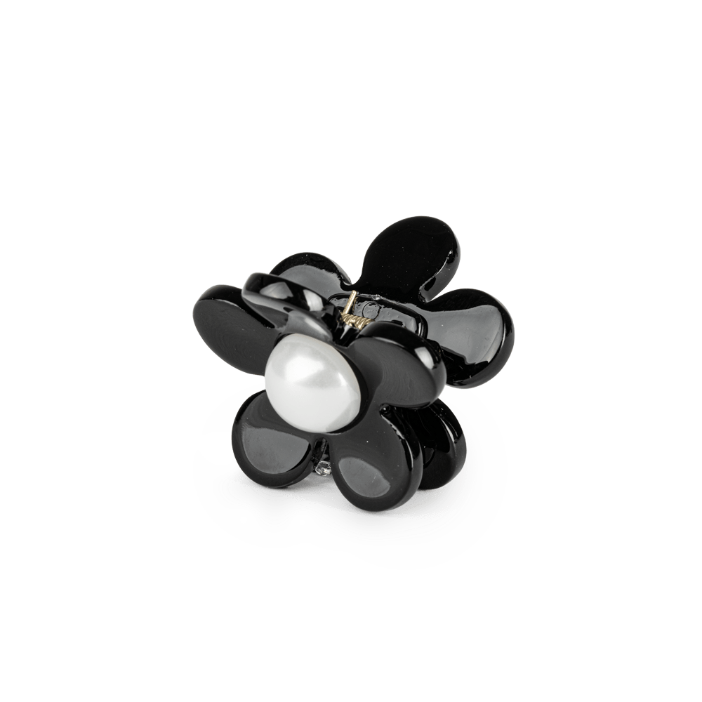 Eva Classic Flower Mini fra SUI AVA – delikat mini hårklemme med et tidløst blomsterdesign, perfekt til at tilføje et elegant og feminint præg til dine frisurer.