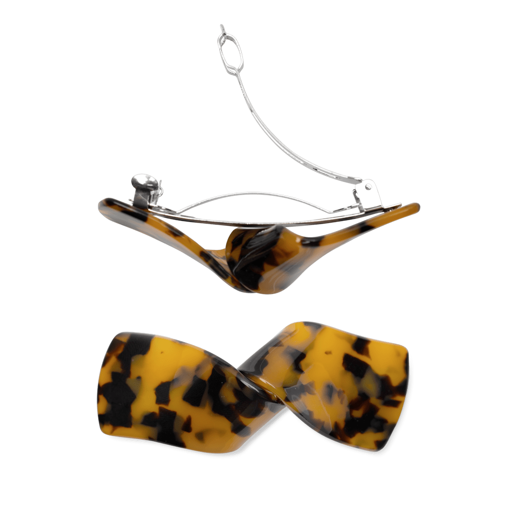 Classic Knot Clip fra SUI AVA – elegant hårklemme med et klassisk knudedesign, perfekt til at tilføje et sofistikeret og tidløst touch til dine frisurer.