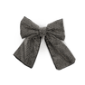 Kelly Crystal Bow hårsløjfe i sort med skinnende krystaller, perfekt som elegant hårpynt til opsætning eller hestehale.