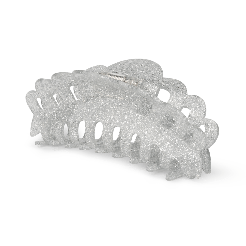 Emma Glitter Giga fra SUI AVA – stor hårklemme med skinnende glimmerdetaljer, perfekt til at tilføje et sofistikeret og festligt touch til dine frisurer.