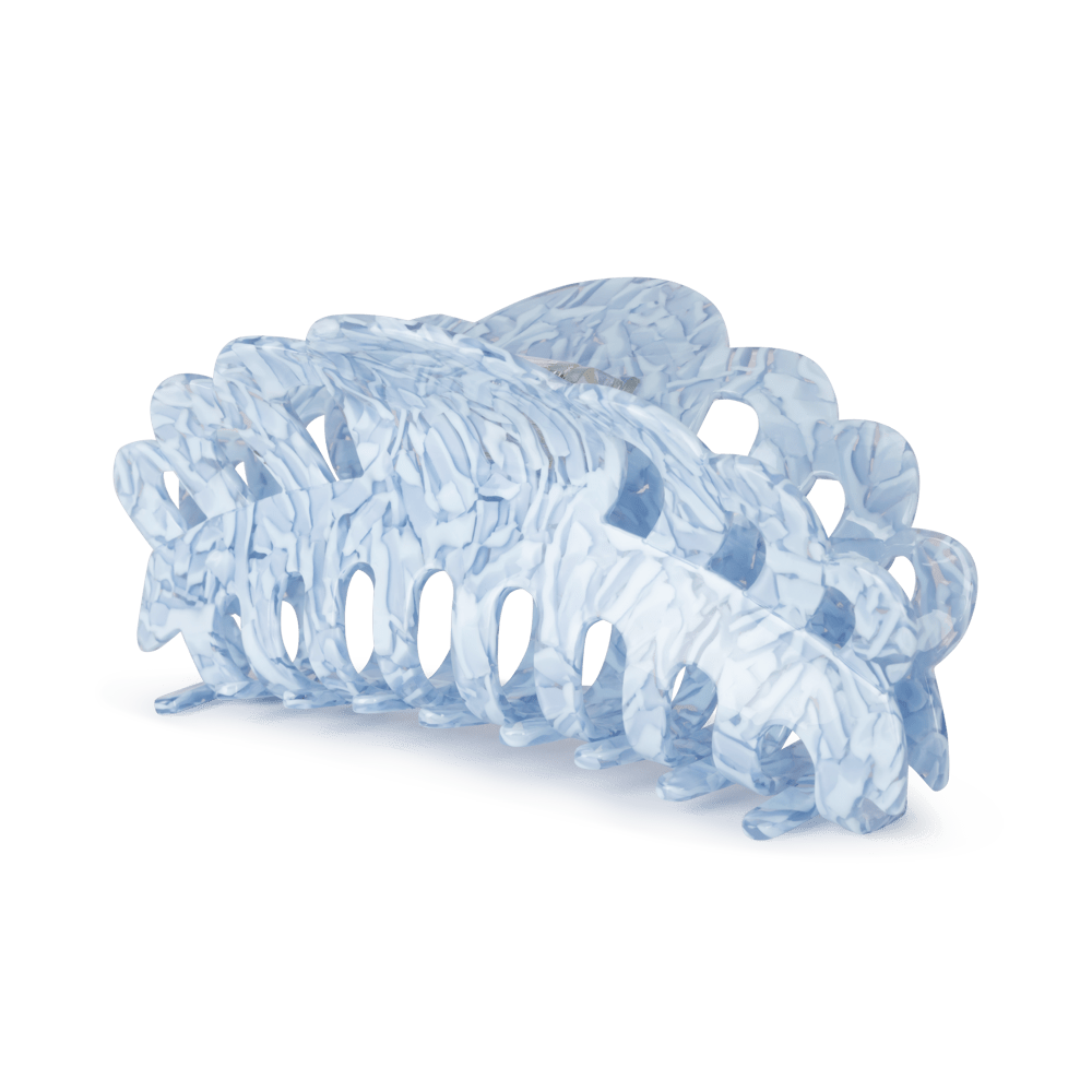 Emma Feather Giga fra SUI AVA – ekstra stor hårklemme med et unikt fjerdesign, perfekt til at skabe iøjnefaldende og elegante frisurer.