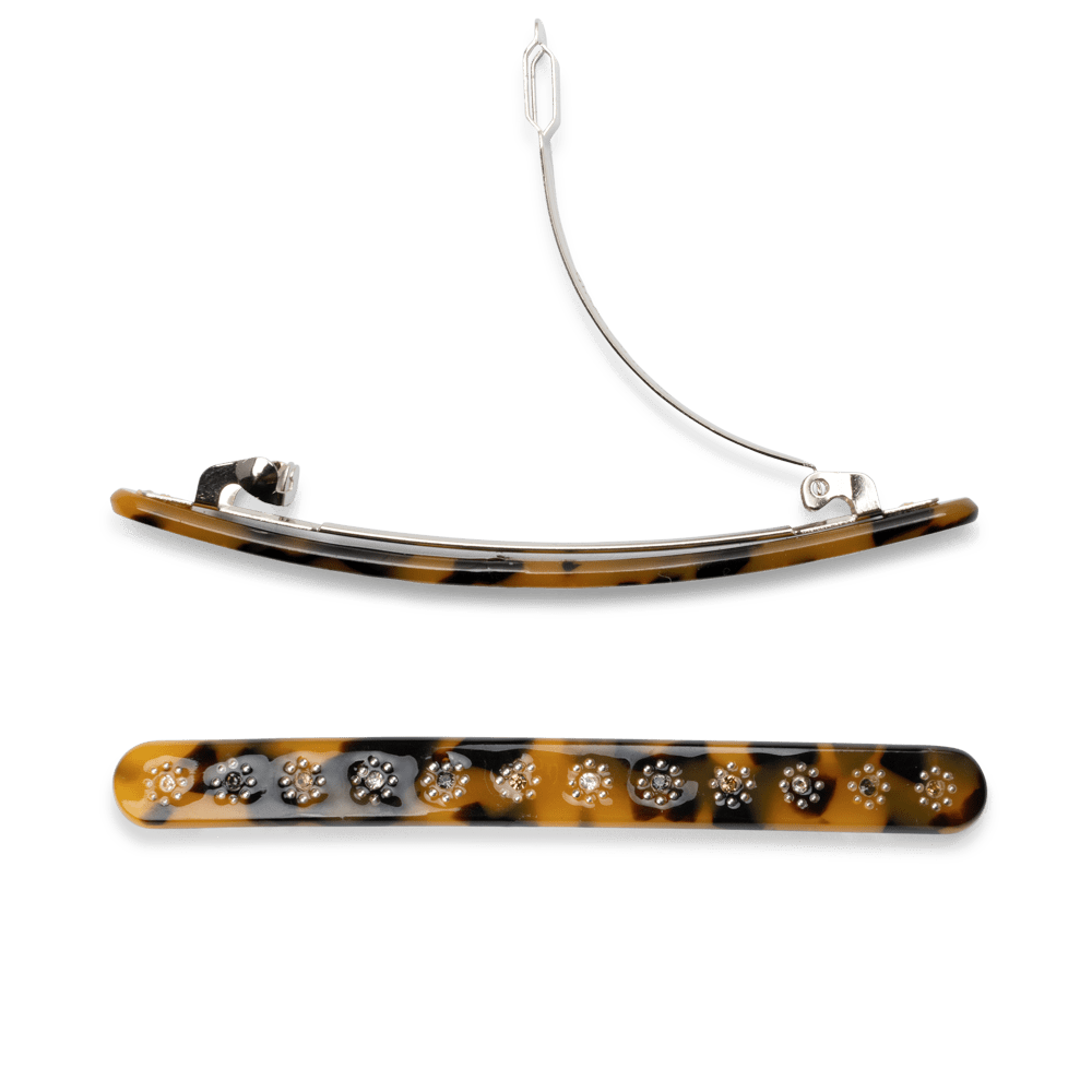 Evergreen hårspænde i tortoise med blomster og små glimtende sten
