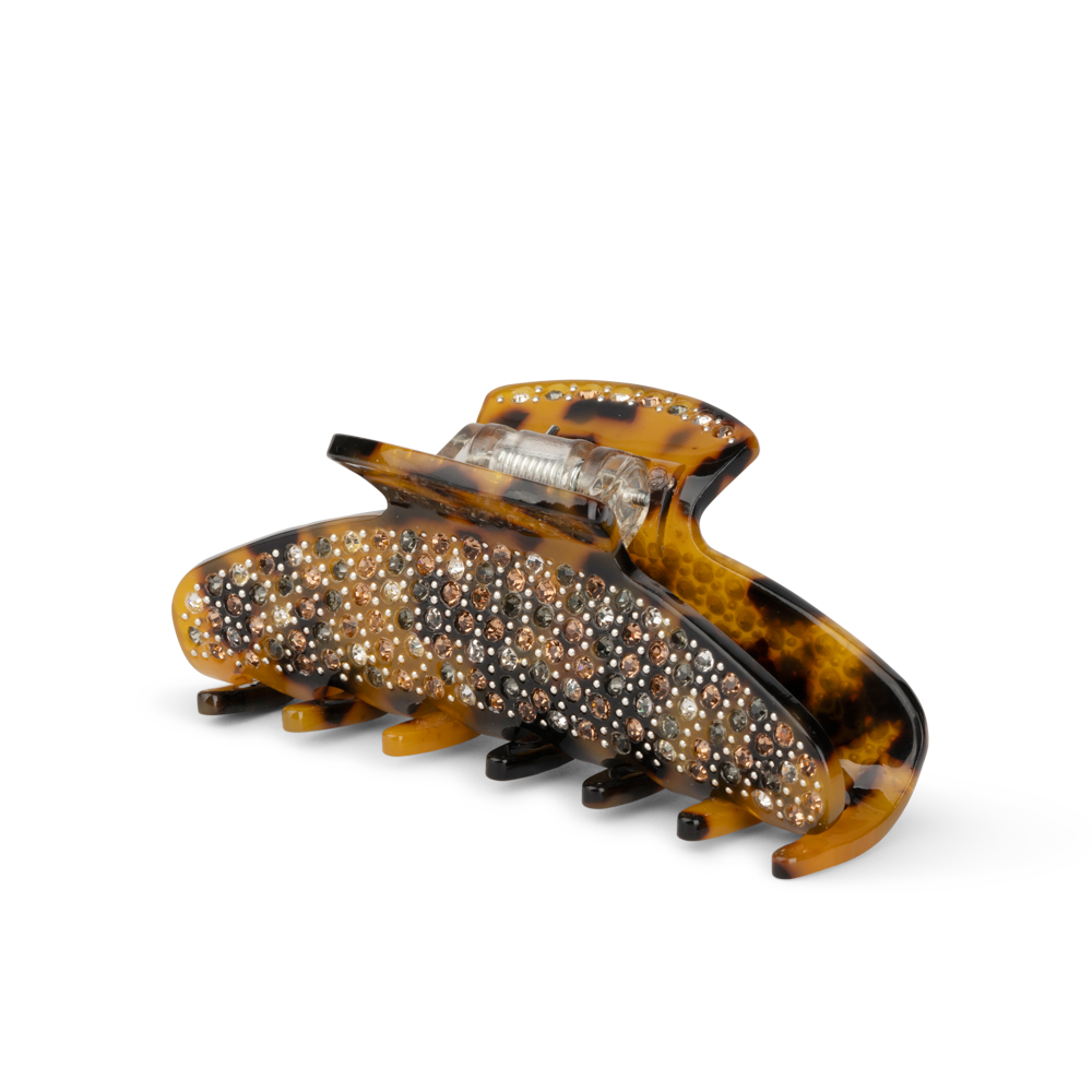 Ida Evergreen Middle fra SUI AVA – stilfuld mellemstor hårklemme med et tidløst og naturinspireret design, perfekt til både hverdags- og festfrisurer.