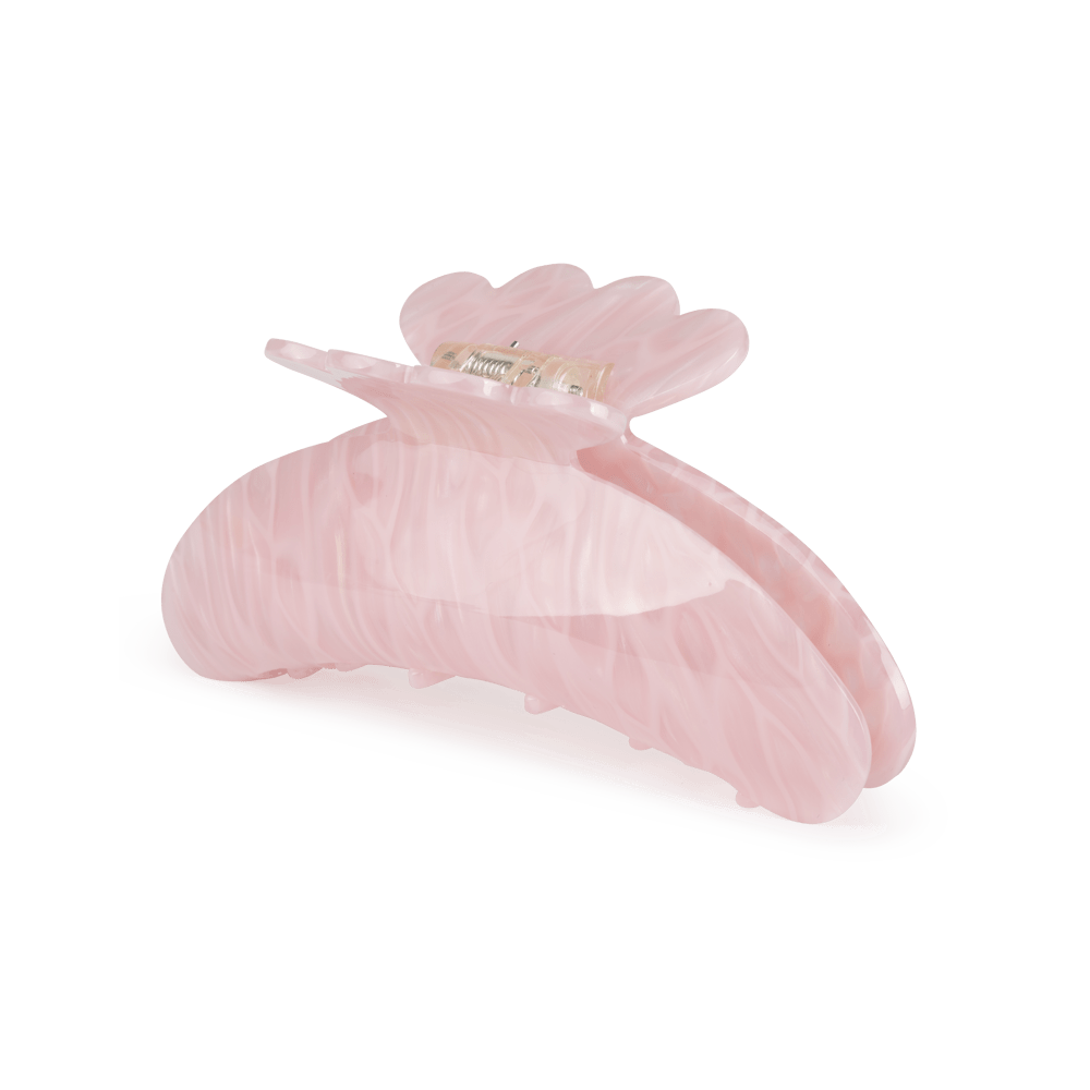 Helle Fluid Big fra SUI AVA – stor hårklemme med et moderne og flydende design, ideel til at skabe elegante og holdbare frisurer med et unikt udtryk.