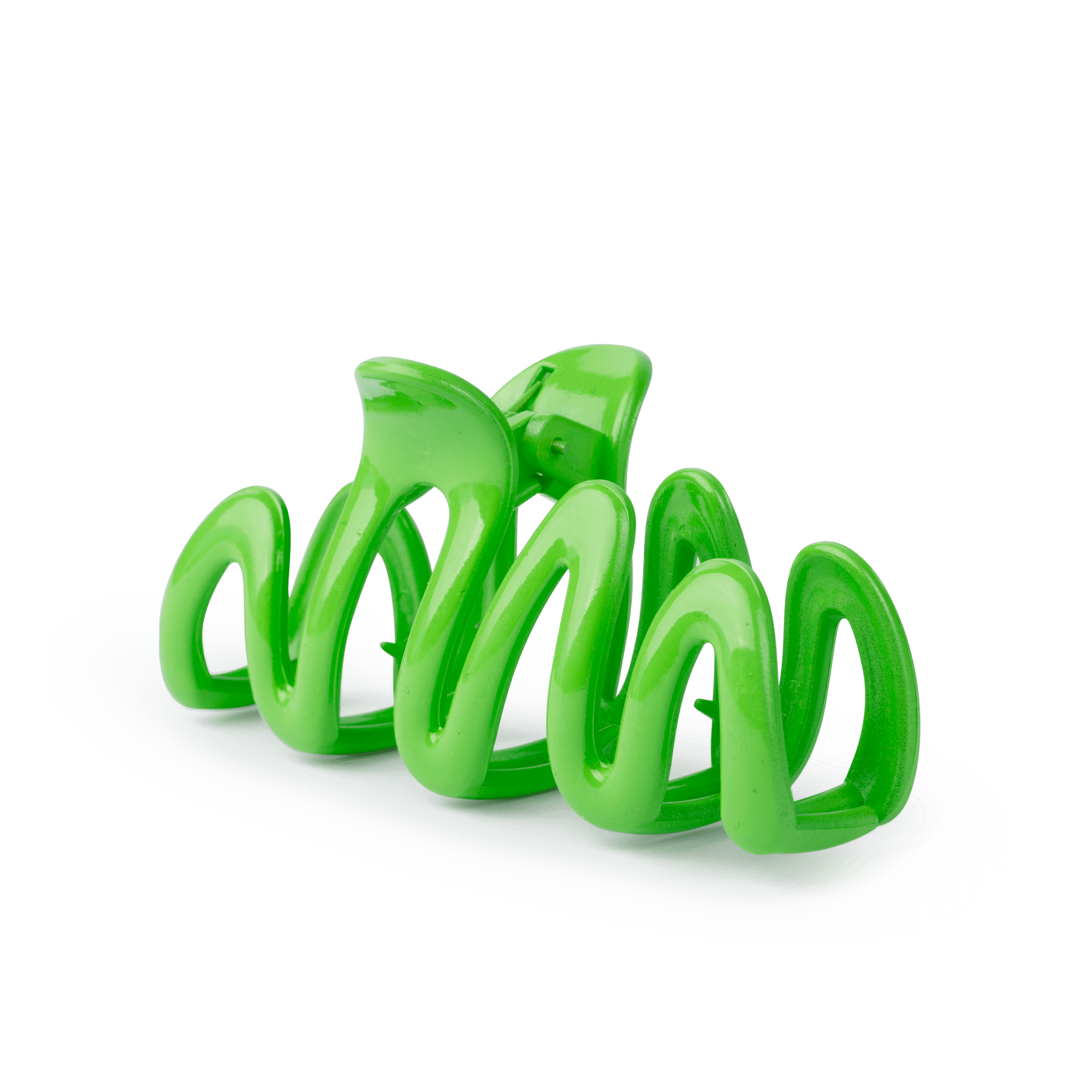 Sketch Big fra SUI AVA – stor hårklemme i en elegant grøn nuance med et unikt kunstnerisk design, ideel til at tilføje et friskt og stilfuldt touch til dine frisurer.