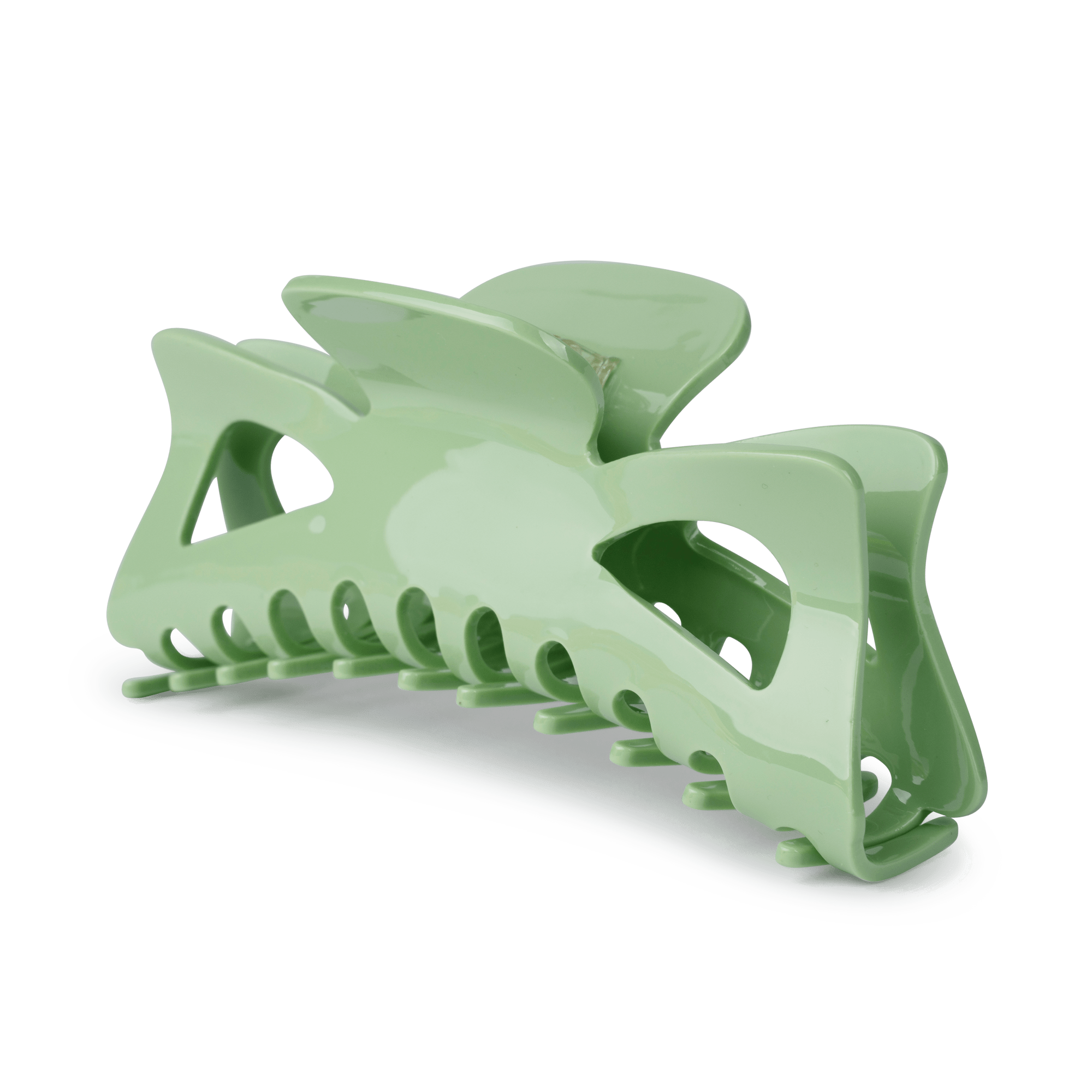 Bow Solid Giga fra SUI AVA – ekstra stor hårklemme med et elegant sløjfedesign i et solidt og tidløst udtryk, perfekt til at skabe iøjnefaldende og sofistikerede frisurer.