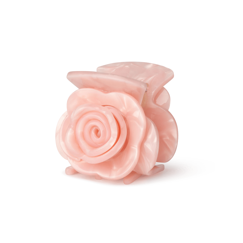 Rosie Mini hårklemme i pink – lille hårklemme formet som en rose, ideel til fint hår eller små sektioner. Elegant og dekorativt design.