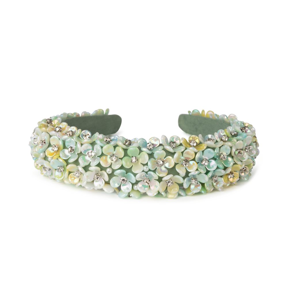 I Can Buy Myself Flowers Headband med små perlemorsblomster og glitrende sten i pastelgrønne nuancer