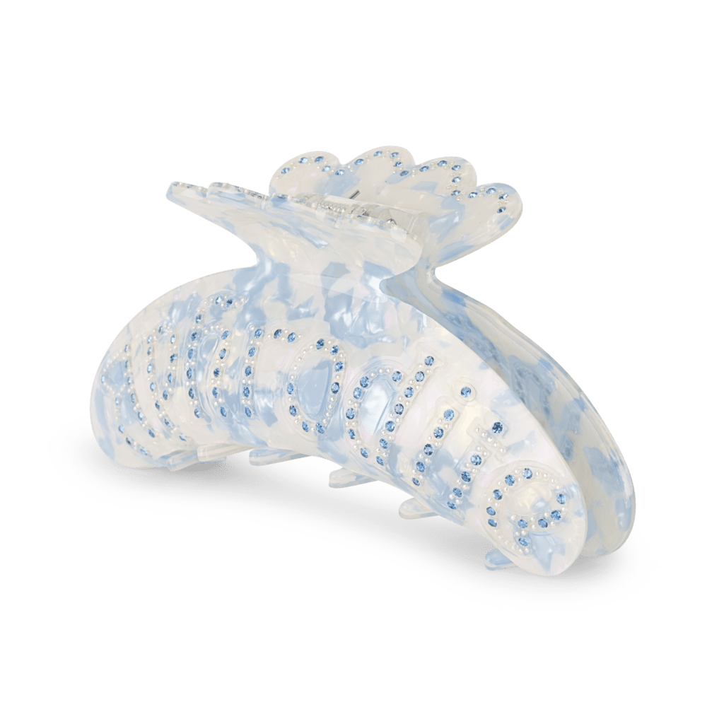 Stor hårklemme i perlemorshvid med blå glimmer og teksten "Aphrodite" - Helle Mother of Pearl Big fra SUI AVA